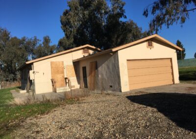 long view of house construction project of tlb builder